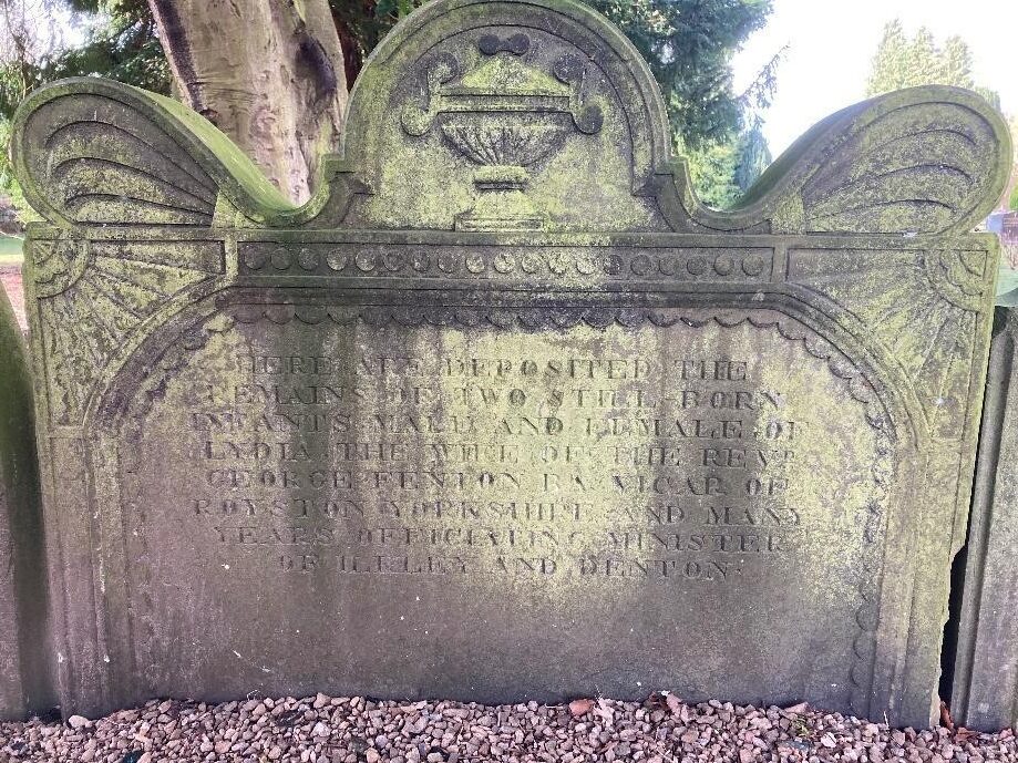 Image shows headstone for two stillborn infants, one male, one female of Lydia and Rev George Fenton