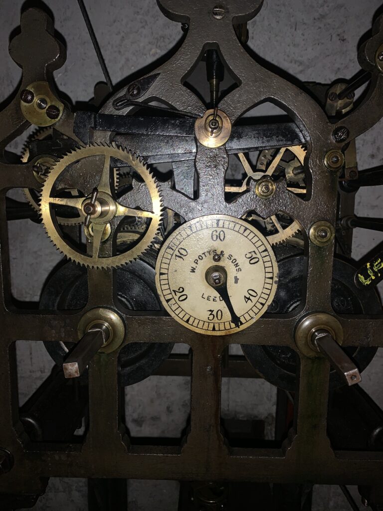 Photo of the 1902 W Potts & Sons clock that replaced the original by Titus Bancroft.